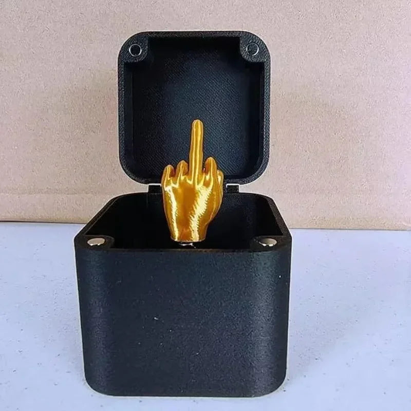 Fuera de la caja pop-up Caja de regalo de dedo medio Escritorio creativo Decoración del hogar Regalos Dedo medio Novedad Navidad Divertido broma Gift2025